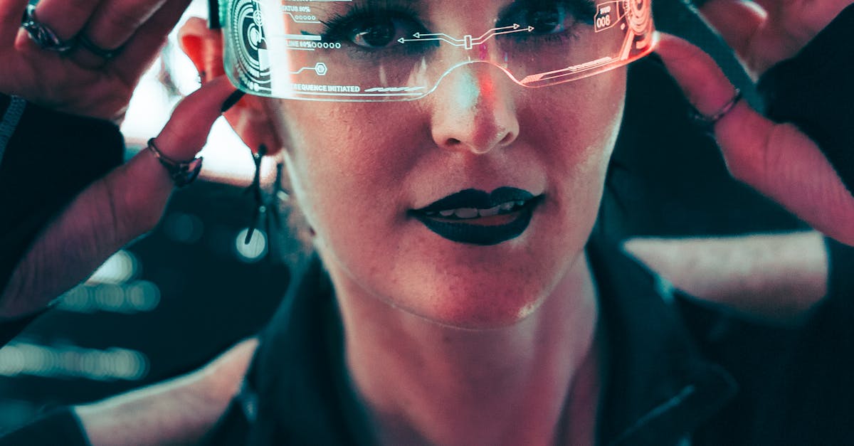 Close-up of a person wearing futuristic smart glasses with a glowing in-lens display